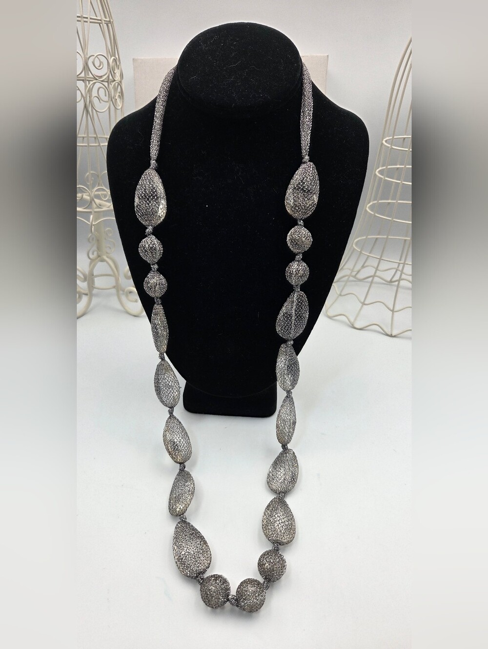 NEW necklace with textured oval pieces in silver tone.